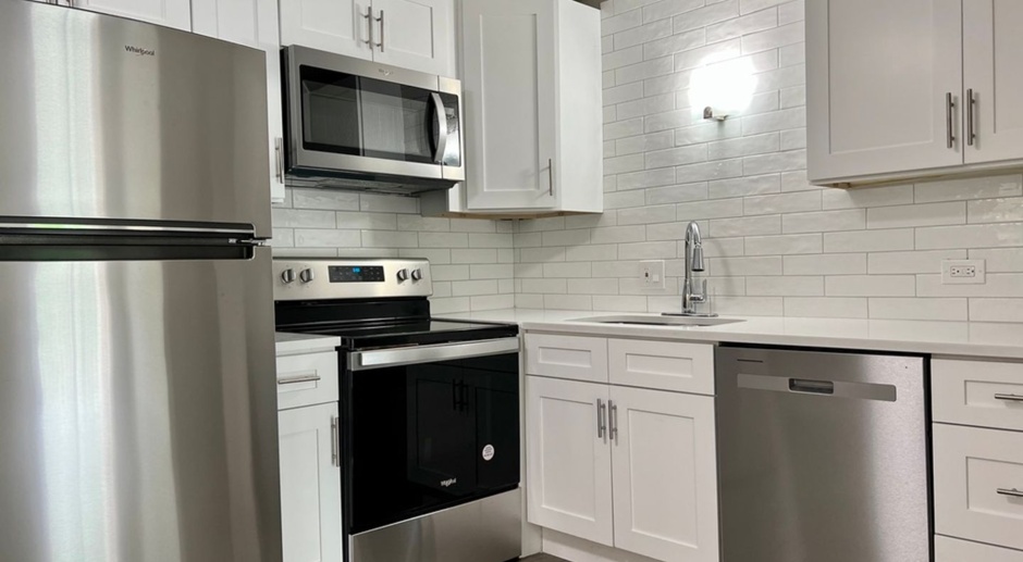 Updated Apartment With NEW KITCHEN & BATH With Balcony/Patio/Private Parking!