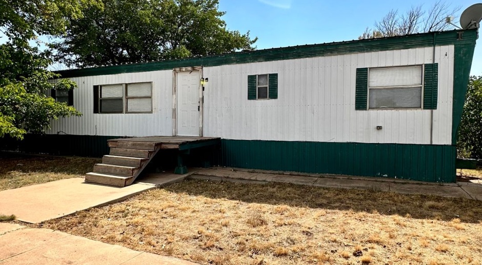 Move in Special 1/2 off first full months rent! - 2 Bedroom Mobile Home With 2 Living Areas!
