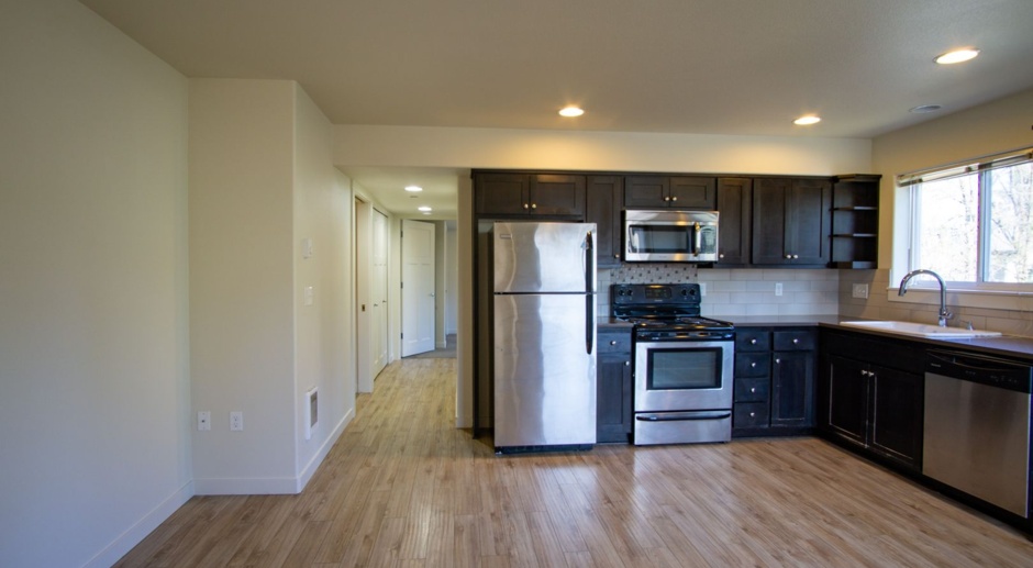 Free Rent! Modern 2 Bedroom with DW, W/D, Patio, Parking + Pet OK!