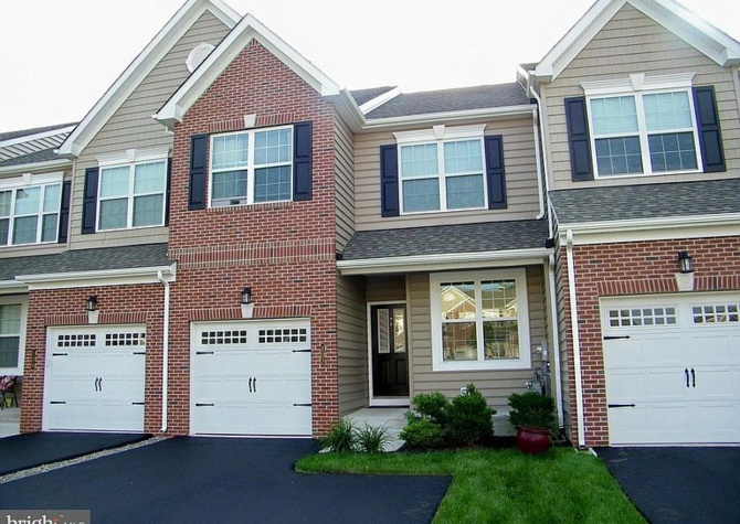 Houses Near Five year-old town home in Mainline Square development in Harleysville