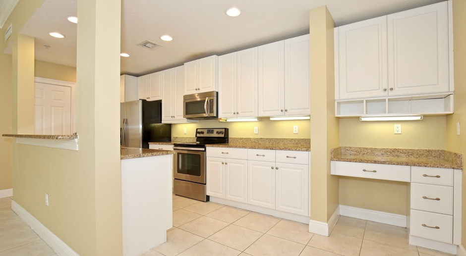 Stunning 3/2.5 Spacious Townhome with a 2 Car Garage Located in the Desirable Baldwin Park - Orlando!