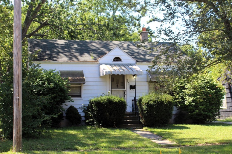 2 bedroom, 1 bath Cape Cod home with a 1 car detached garage, basement, and fenced in backyard.