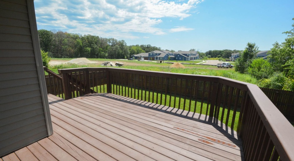 Enjoy the beauty of summer on the deck of this amazing home!