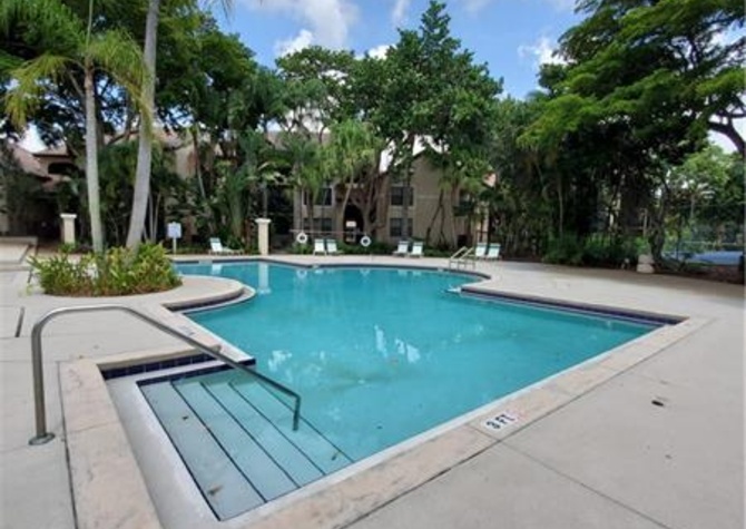Houses Near Modern 1 Bed, 1 Bath Condo at Palm Aire Gardens | Pool & Amenities Included!
