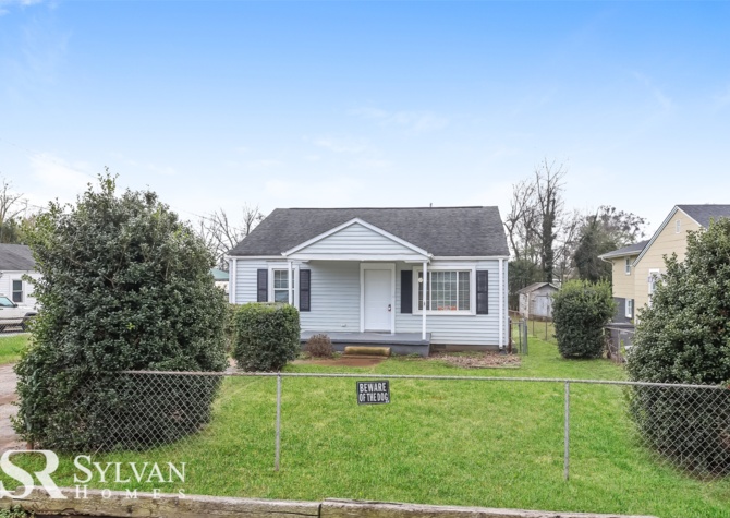 Houses Near Charming 2-bedroom, 1-bath home with a rocking chair front porch.